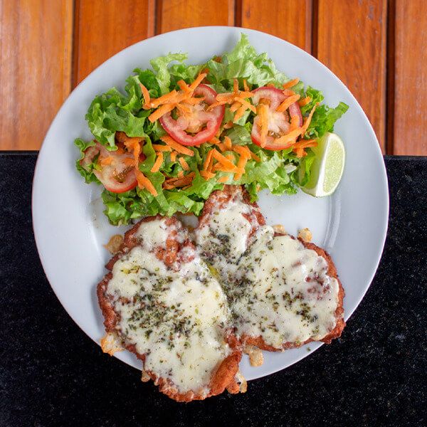 Milanesa de pollo a la napolitanα