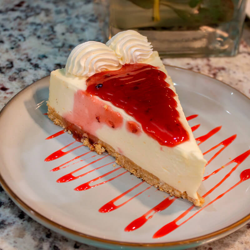 Cheescake Frutos Rojos (Porción)